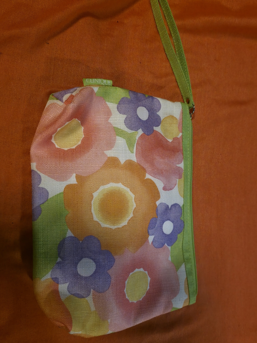 4/$25 Deal! Clinique Floral Wristlet Pouch in Orange, Purple, Pink & Green